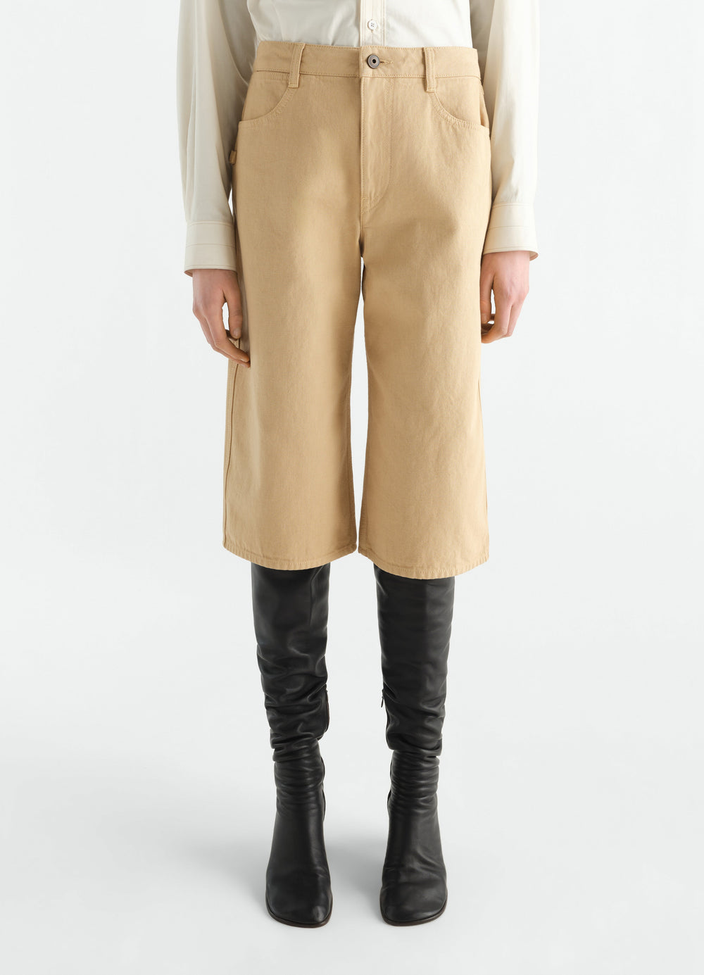 Five-pocket beige heavy garment-dyed broken twill Bermuda shorts LEMAIRE worn by a model front view