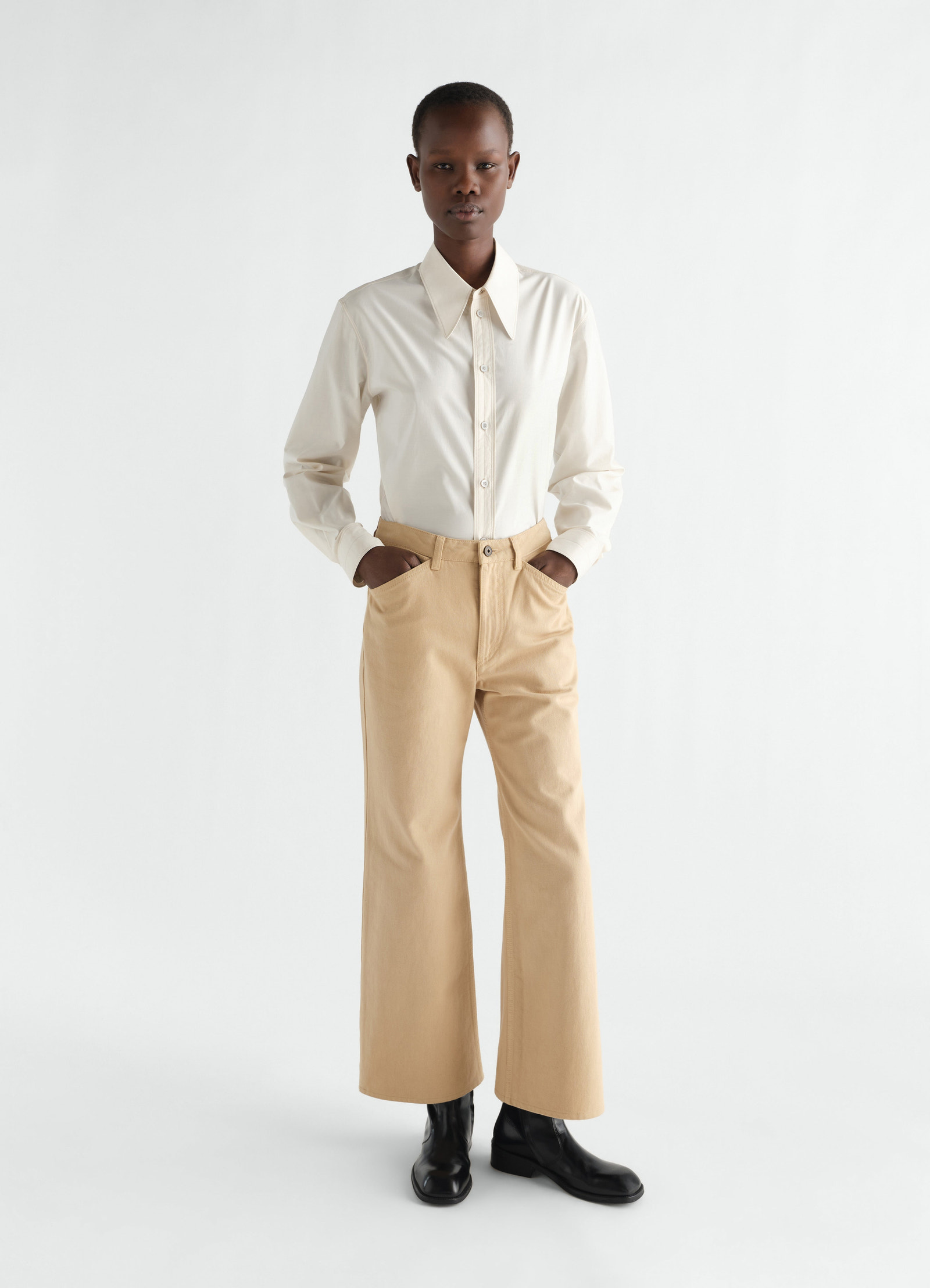 Flared five-pocket pants in heavy garment-dyed broken twill