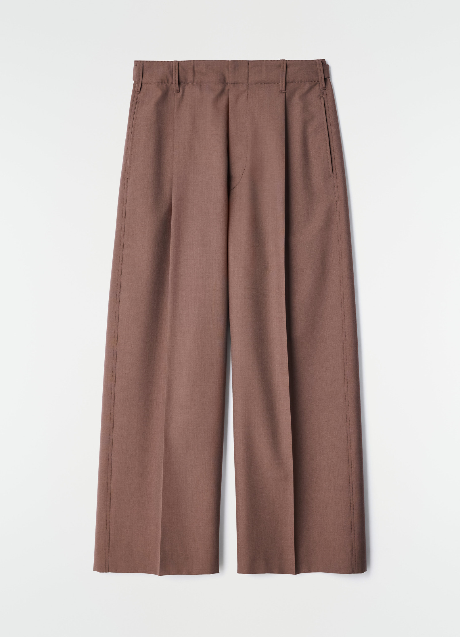 Single-pleat tailored wool blend brown pants by lemaire flat lay on white background with side pockets