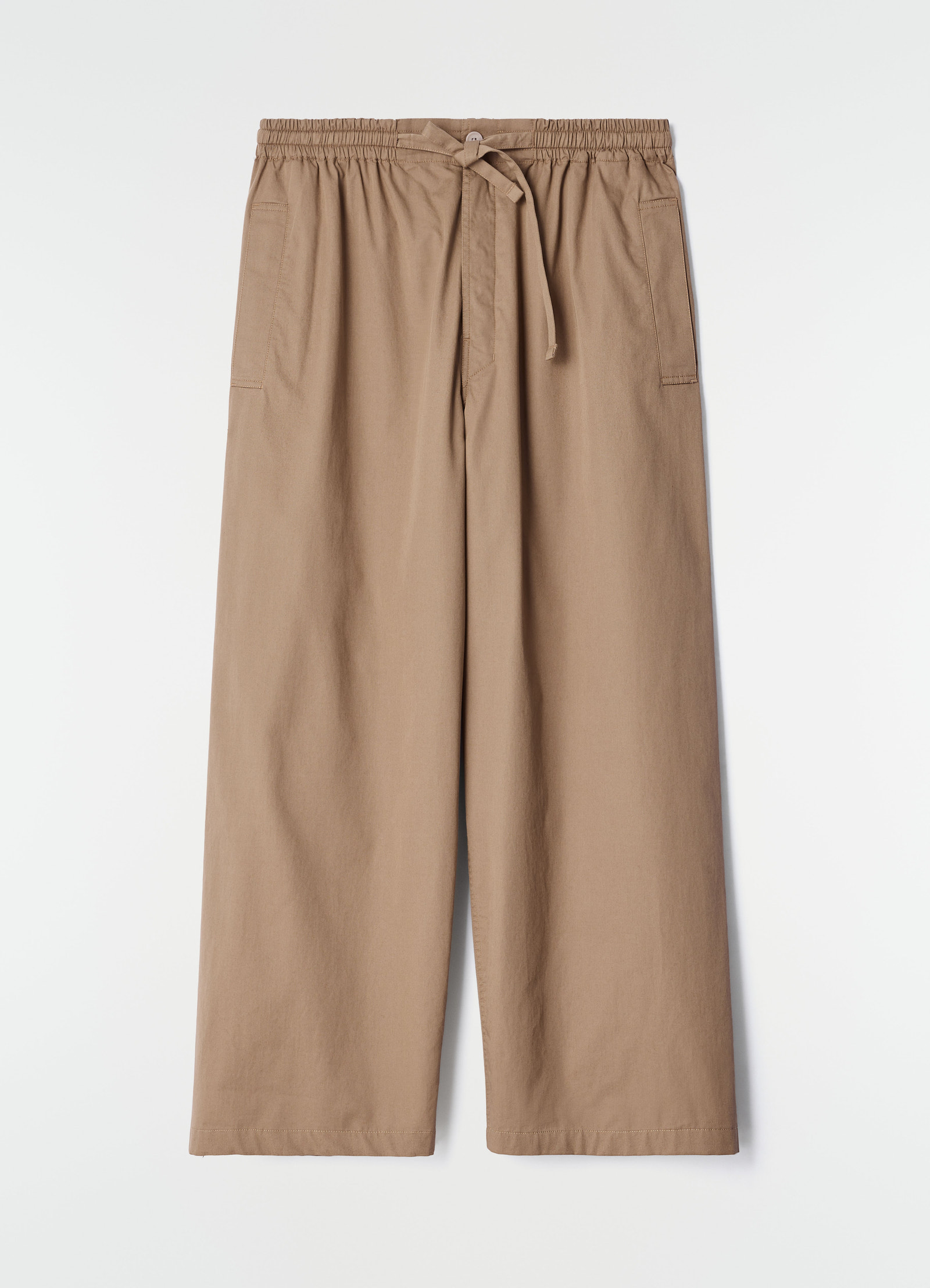 Pyjama pants in light brown cotton twill lemaire flat lay front view with elastic waist and tie belt