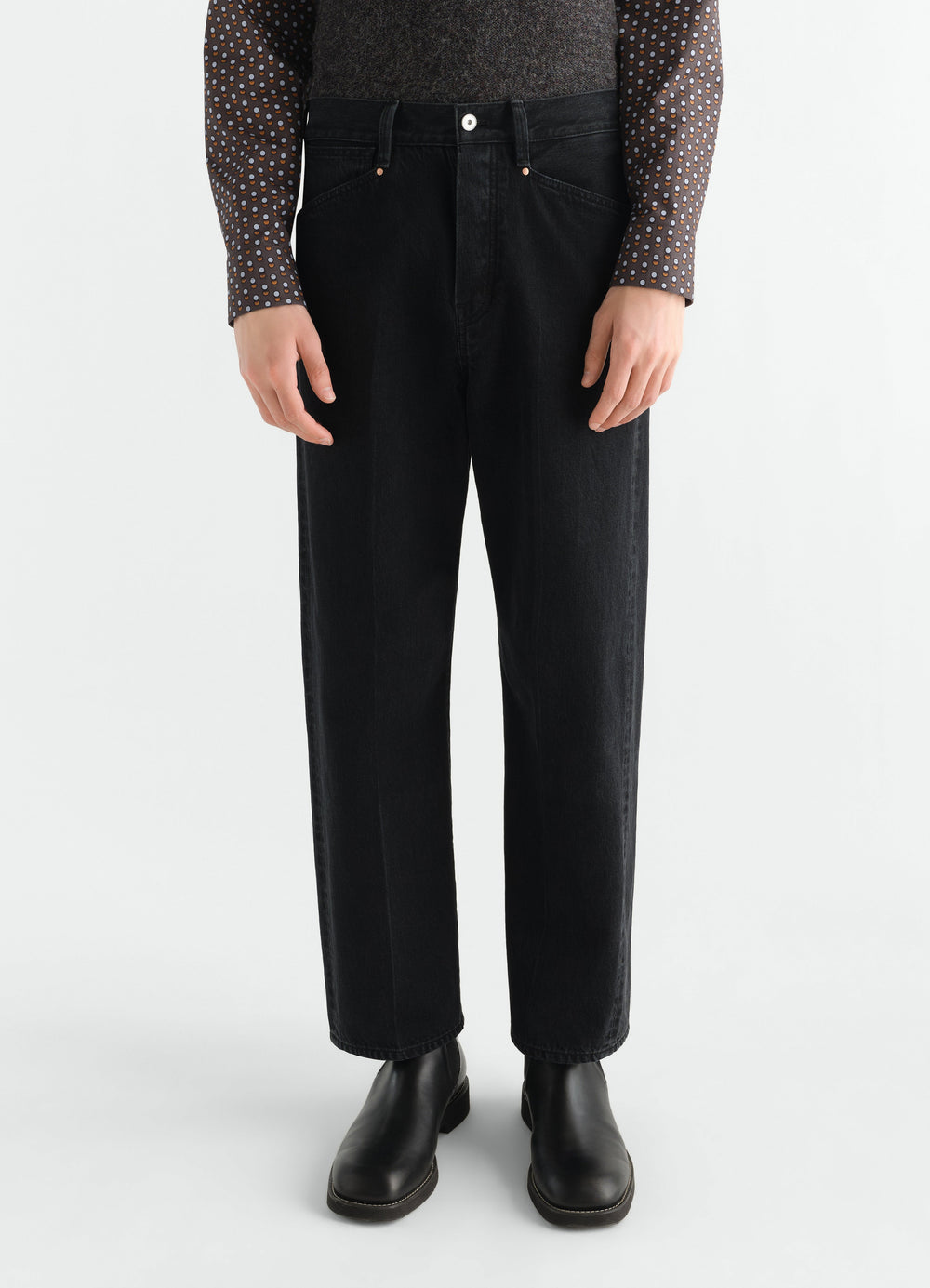 Straight black washed selvedge denim pants LEMAIRE front view worn by model with black boots