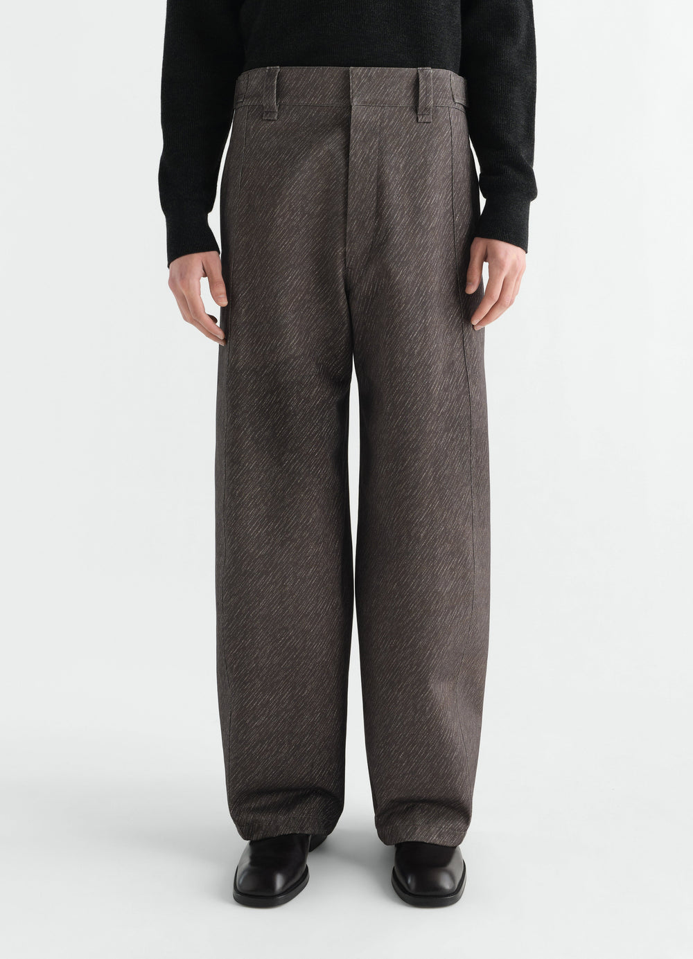 Maxi pants LEMAIRE in brown diagonal printed cotton worn by a model front view with black shoes and sweater