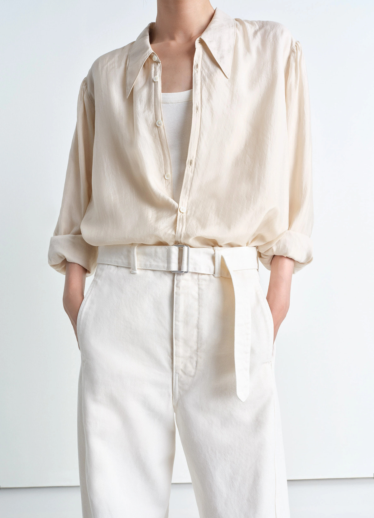 Lemaire twisted belted pants in garment dyed snow heavy denim, model shot, waist detail shot belted waist, wide leg