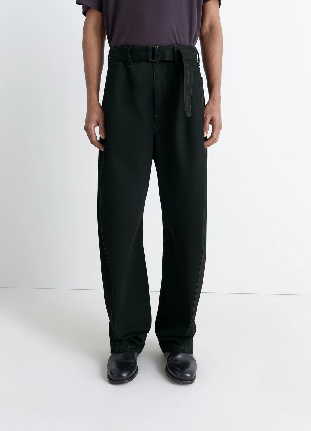 Lemaire Twisted Belted Pants in Deep Black Heavy Denim, model shot, porte straight front view belted relaxed cut