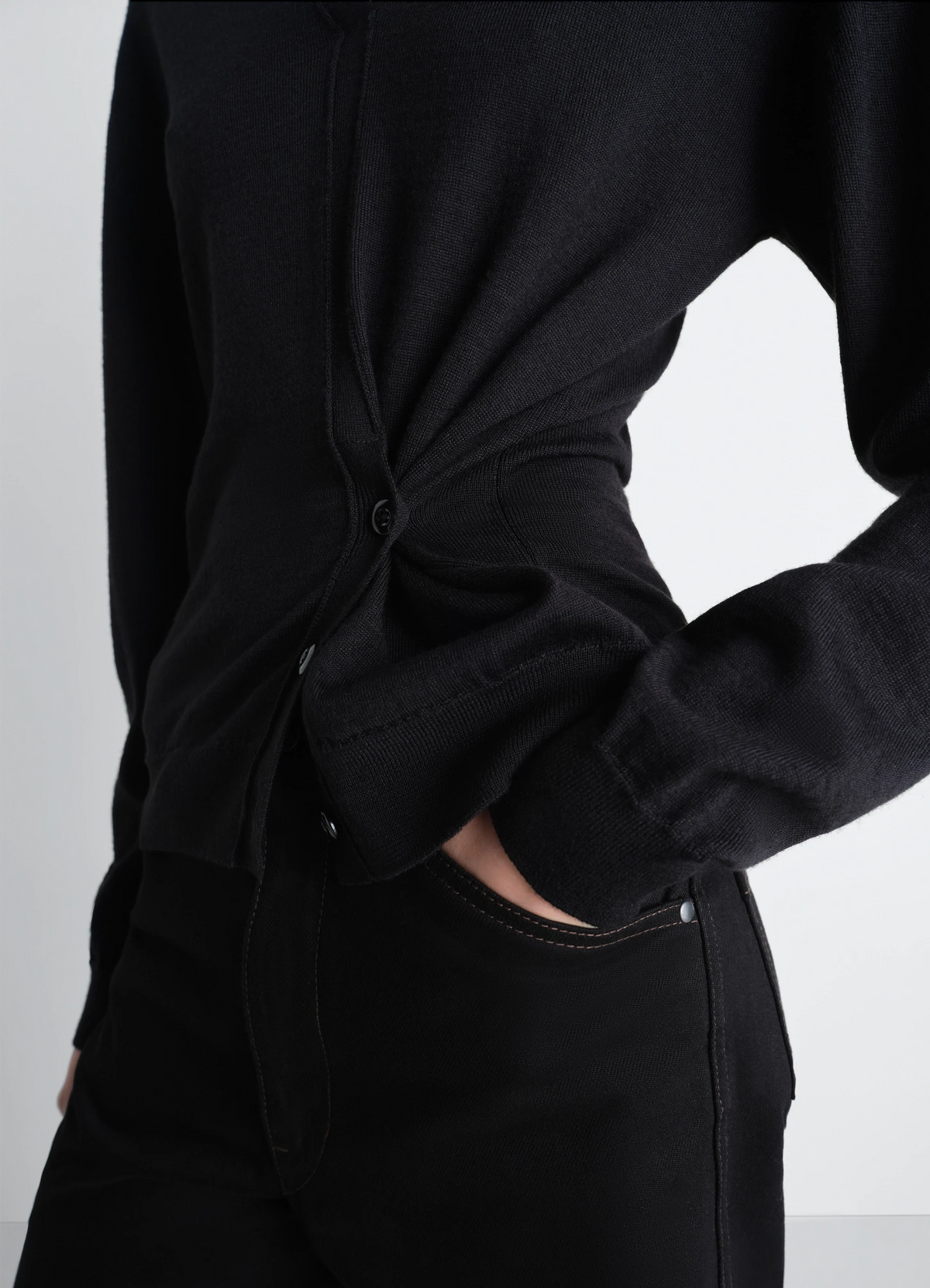 TWISTED V NECK JUMPER in Black Merino Blend, model shot, Front view Twisted with button placket
