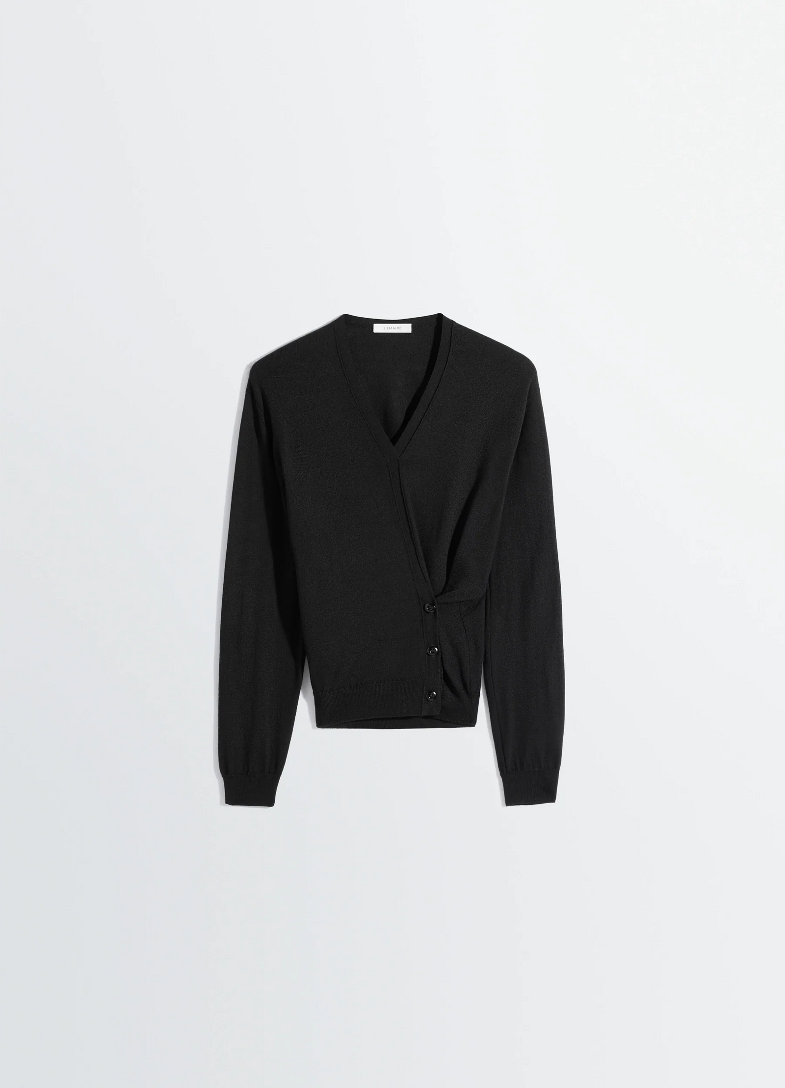 메리노 혼방 소재의 트위스트 v넥 점퍼