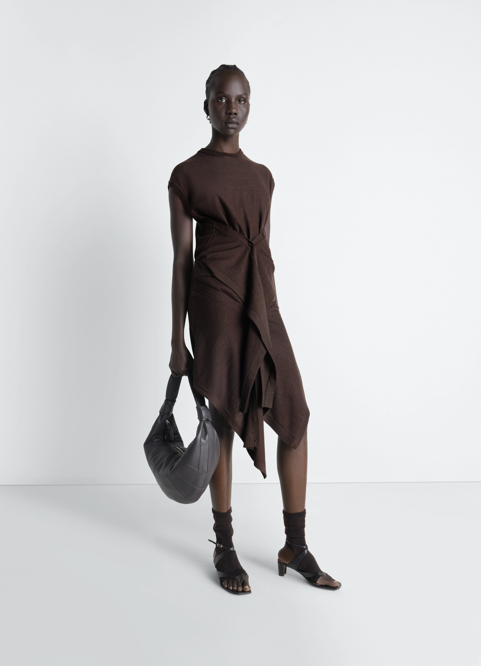 Lemaire sleeveless buttoned top in brown merino blend, model shot, front view draped design