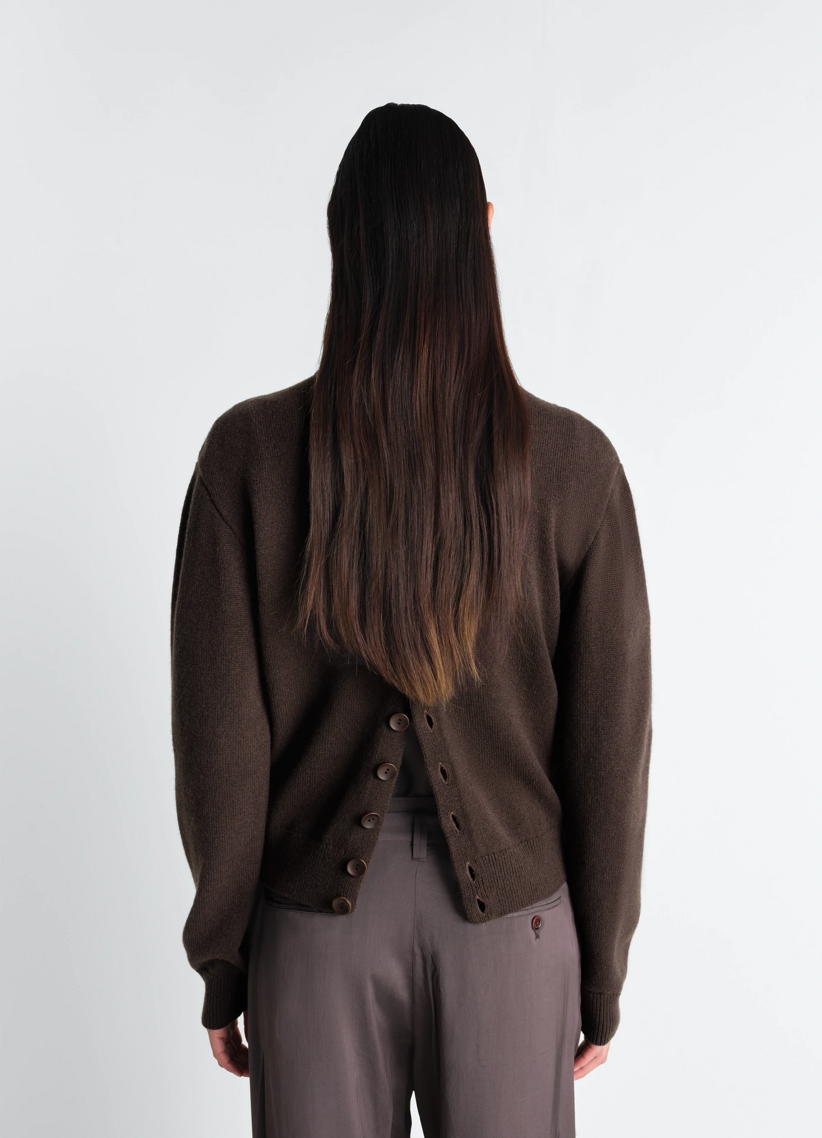 Lemaire reversible buttoned sweater in cashmere wool, model shot, back view worn unbuttoned back view