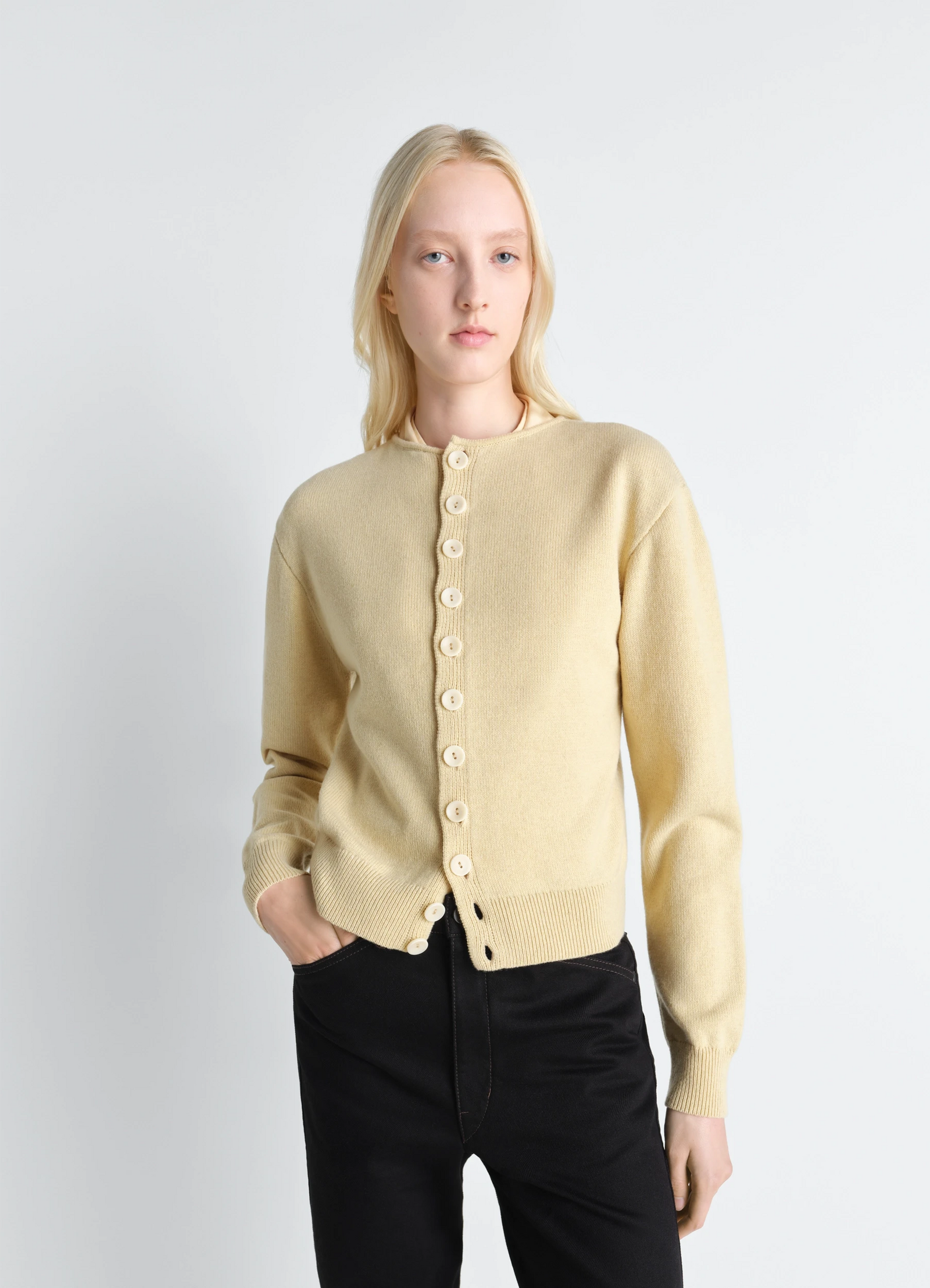 Lemaire reversible buttoned sweater in cashmere wool, model shot, front view crew-neck, buttoned front
