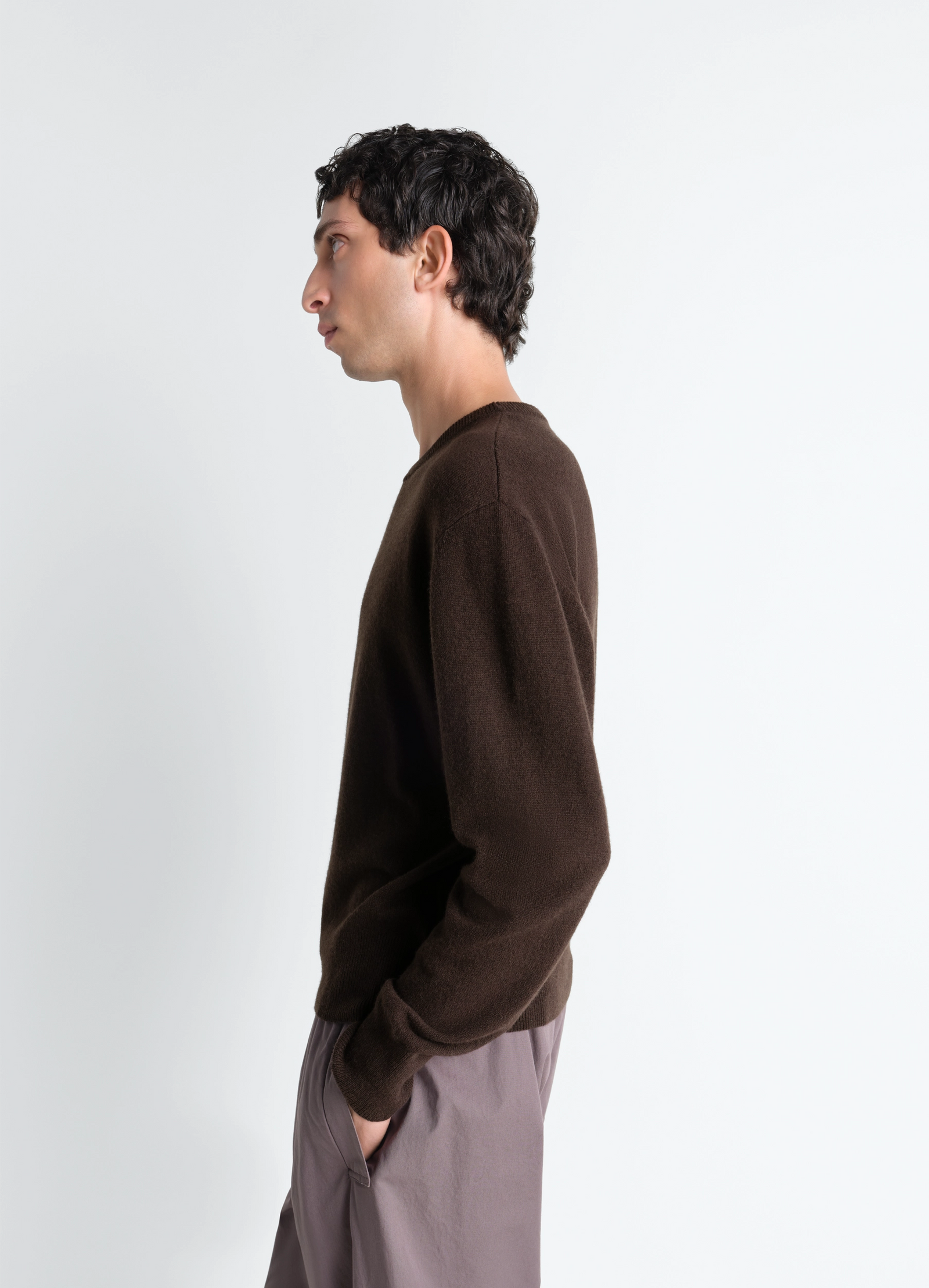 Lemaire crew neck sweater in cashmere wool brown, model shot, profile view unisex tapered fit