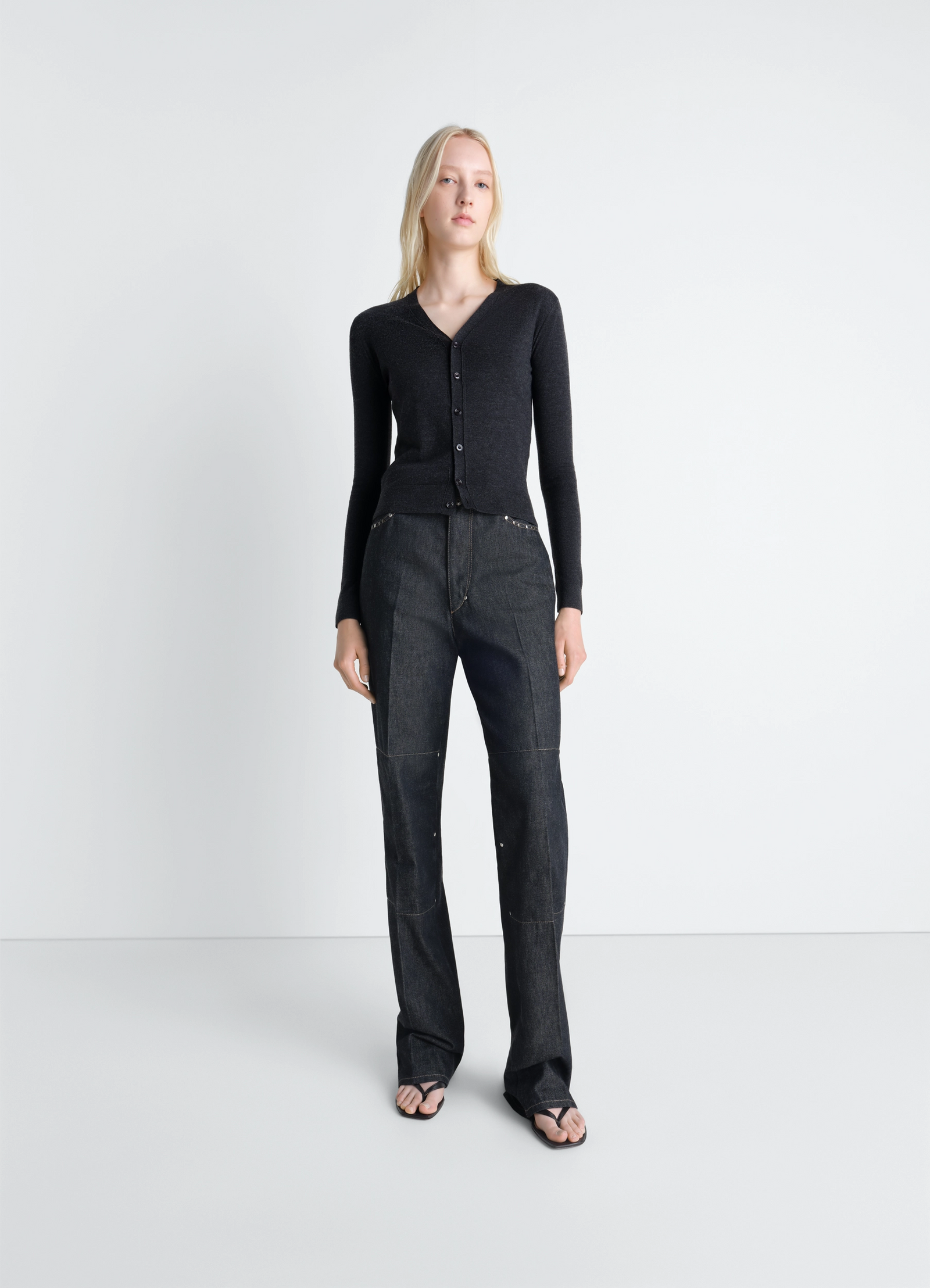 Lemaire v neck buttoned cardigan in fine wool, model shot, angled view long sleeves