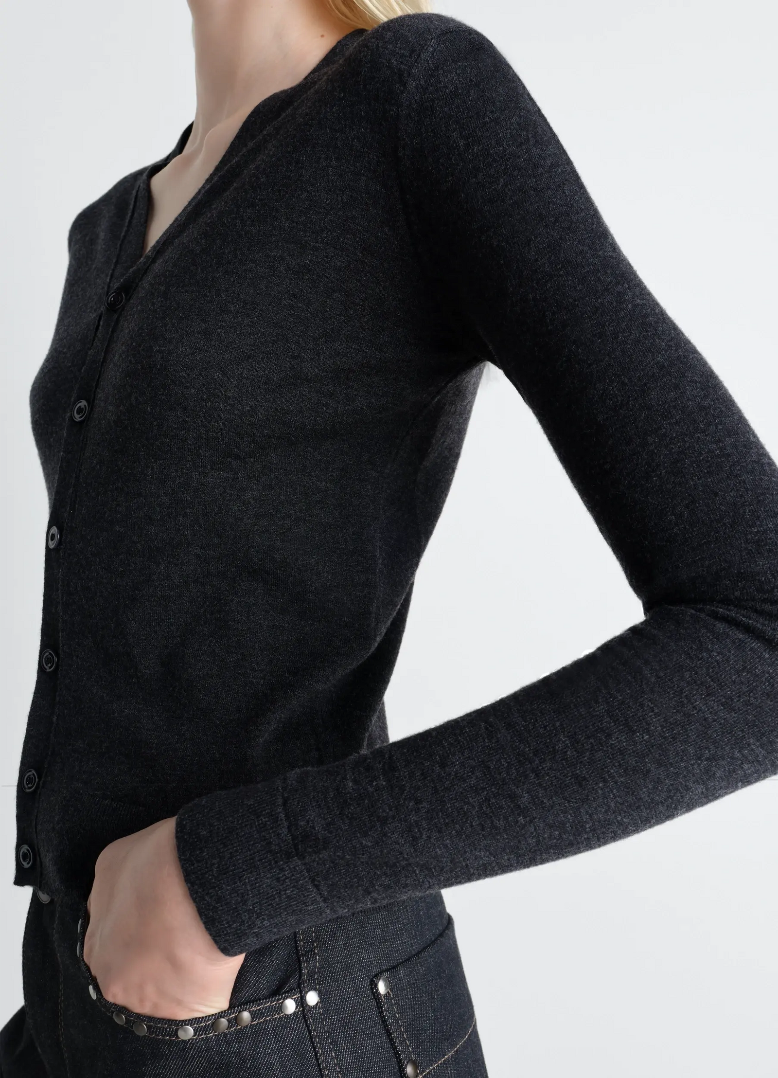 Lemaire v neck buttoned cardigan in fine wool, model shot, side detail view textured fabric