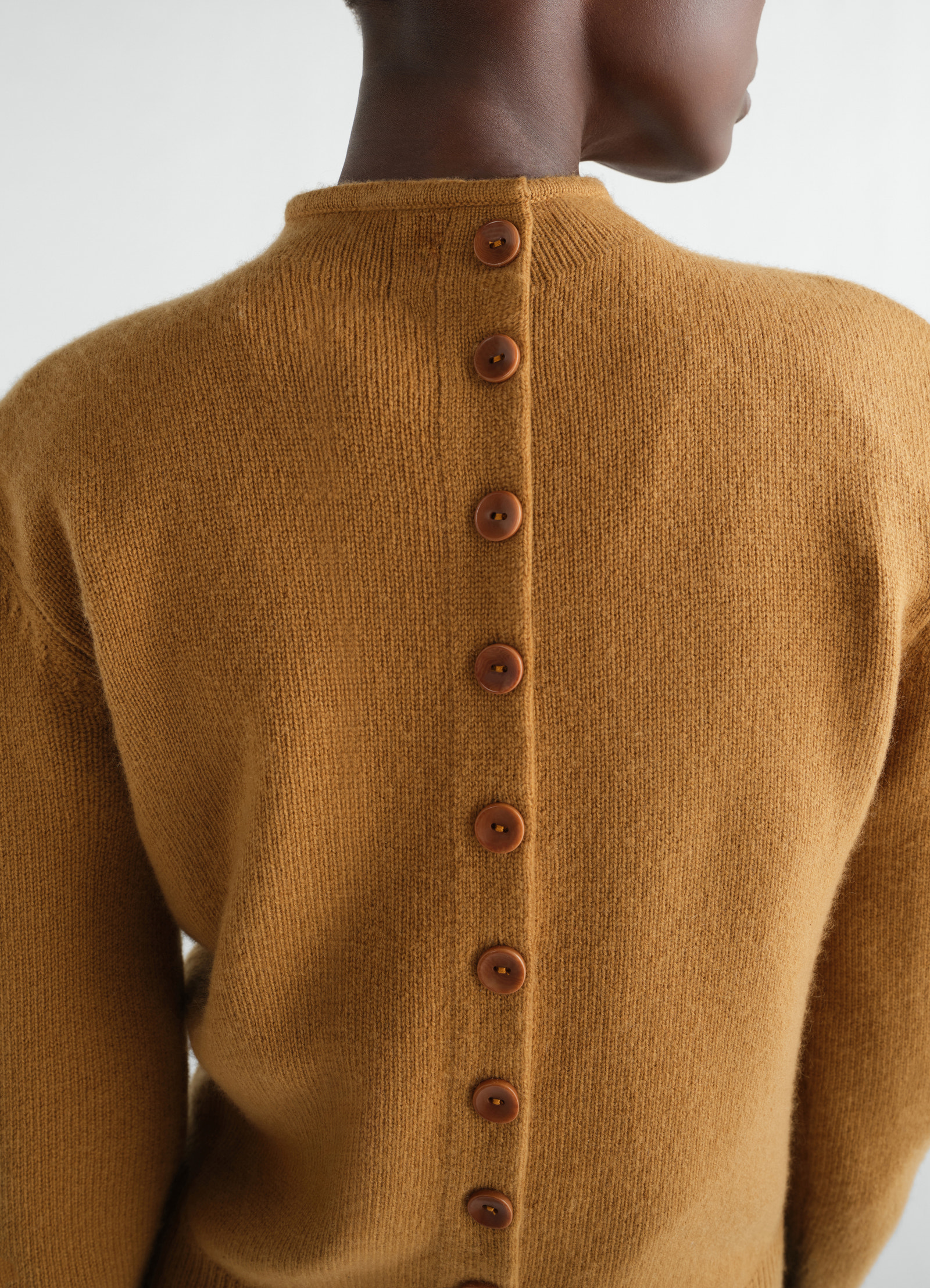 Reversible buttoned sweater in cashmere