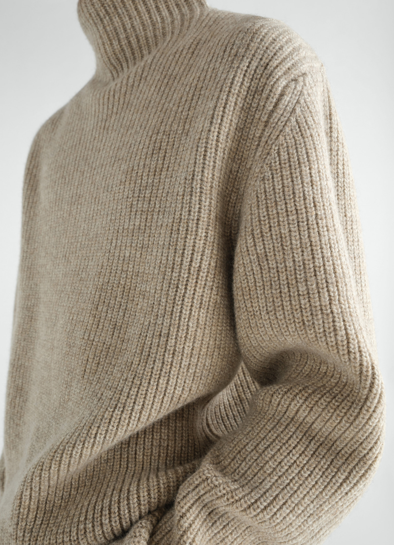 High neck beige yak alpaca ribbed sweater by lemaire close-up detail worn by model