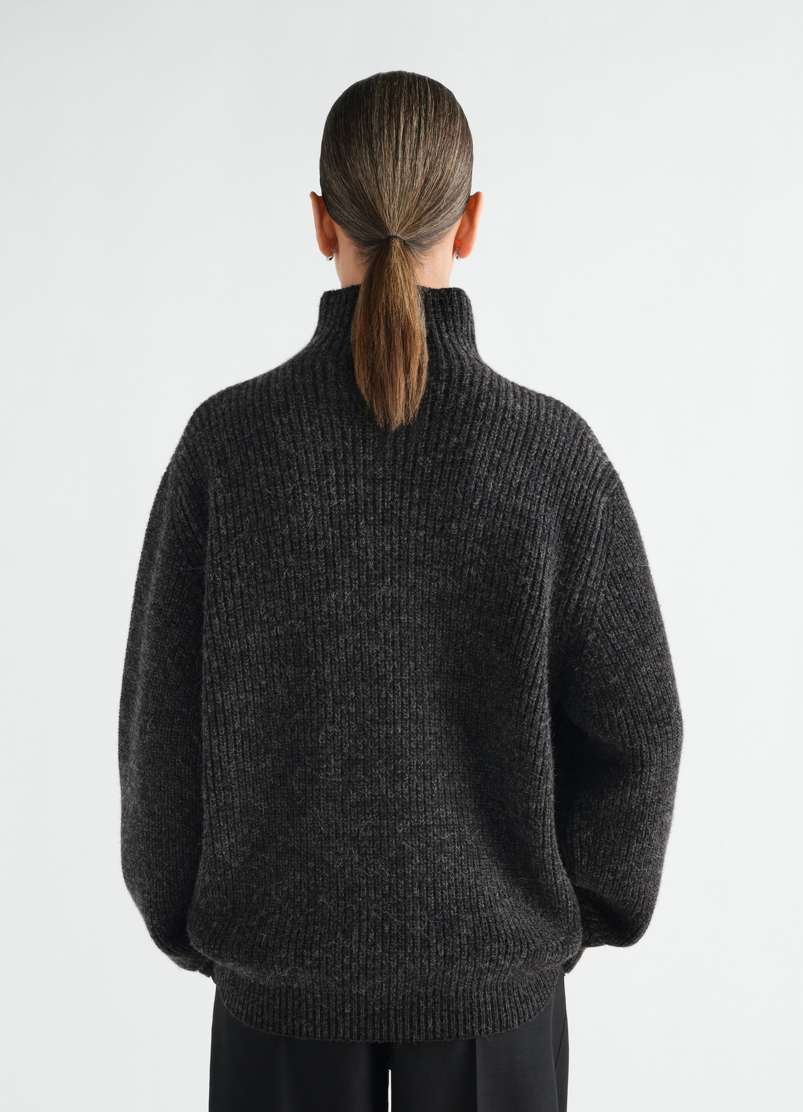 High neck dark grey yak alpaca sweater lemaire worn by model back view with ribbed texture
