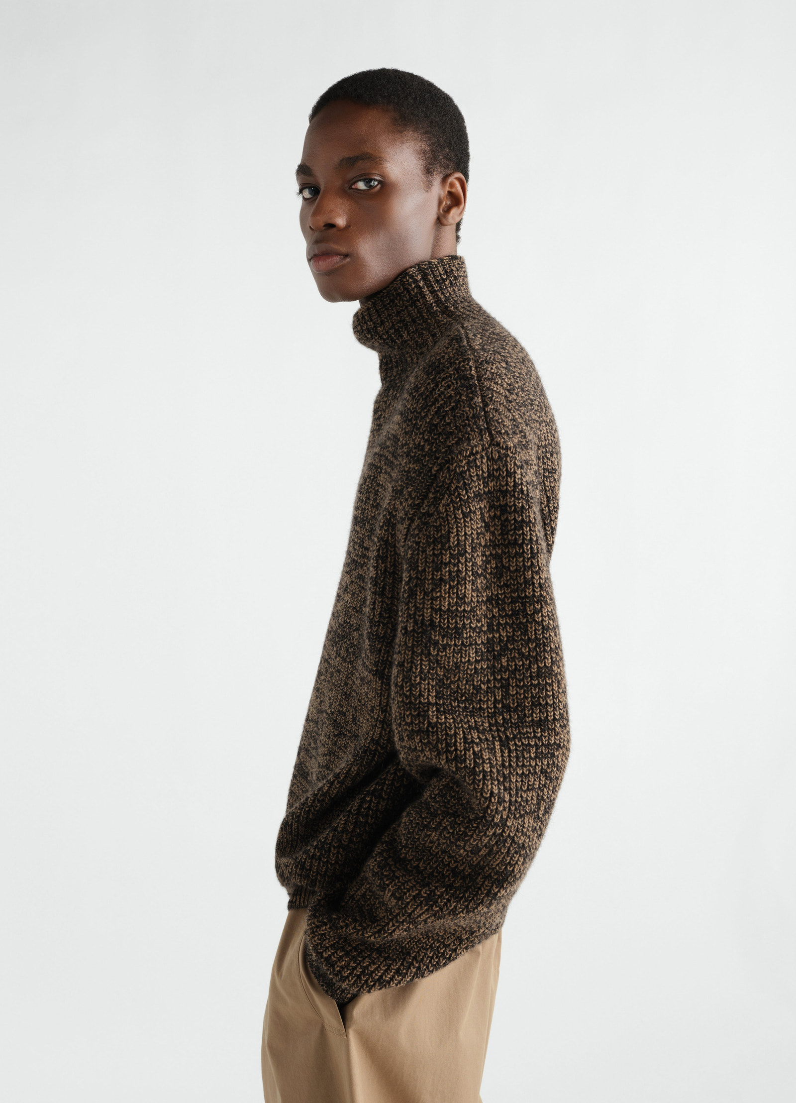 High neck yak alpaca brown marled wool sweater by lemaire worn by a model side view