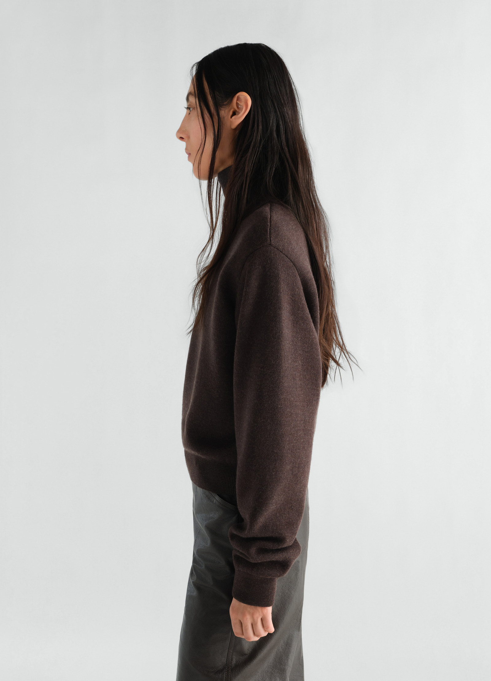 Short brown felted merino wool sweater by lemaire worn by model side view