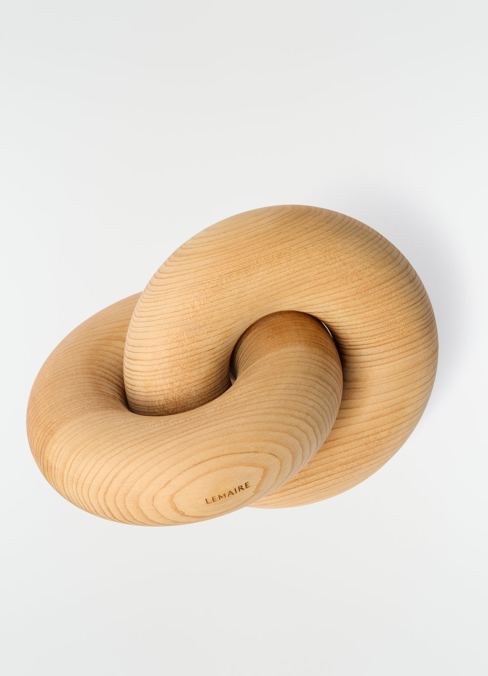 Wood link accessory LEMAIRE natural wood material close-up detail on plain white background