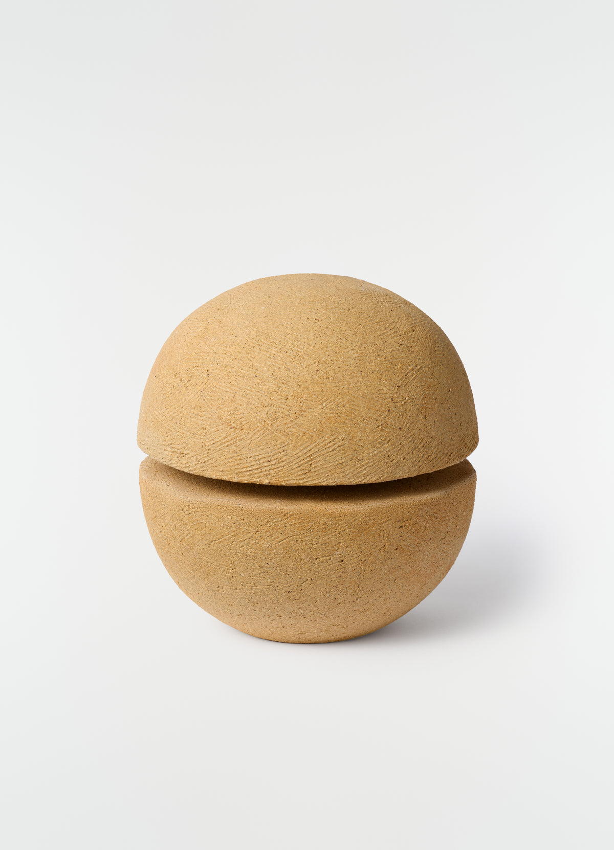 Annie Fourmanoir Emboitage in beige textured material by LEMAIRE on plain white background
