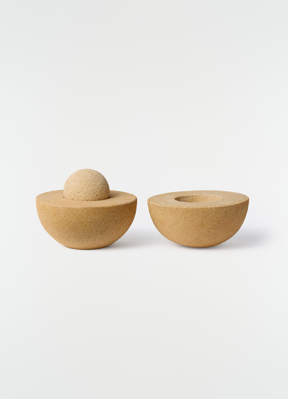Annie Fourmanoir Emboitage natural stone container set styled on white background LEMAIRE