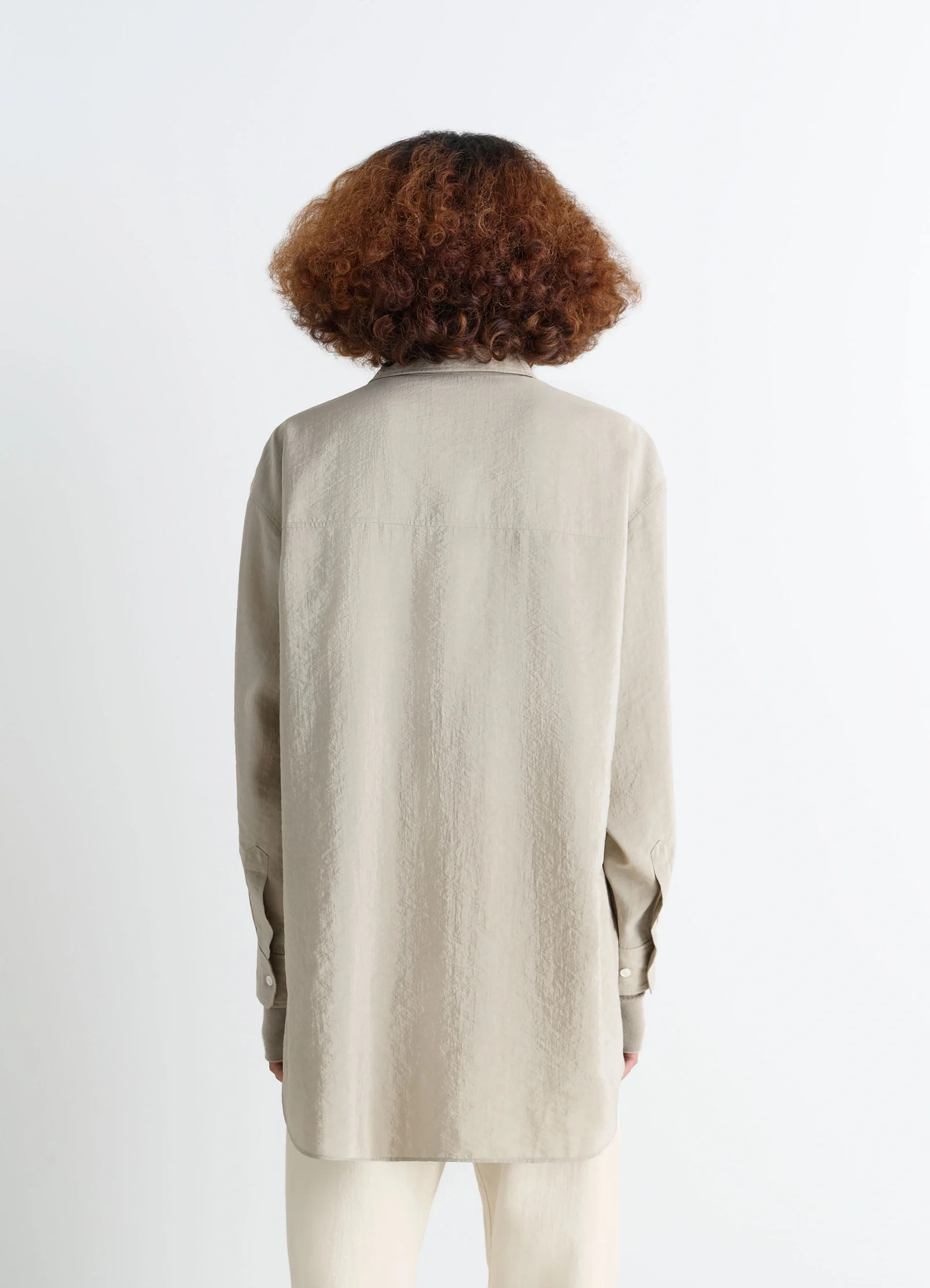Lemaire long shirt with tie in dry silk blend, model shot, back view curved hem, loose fit