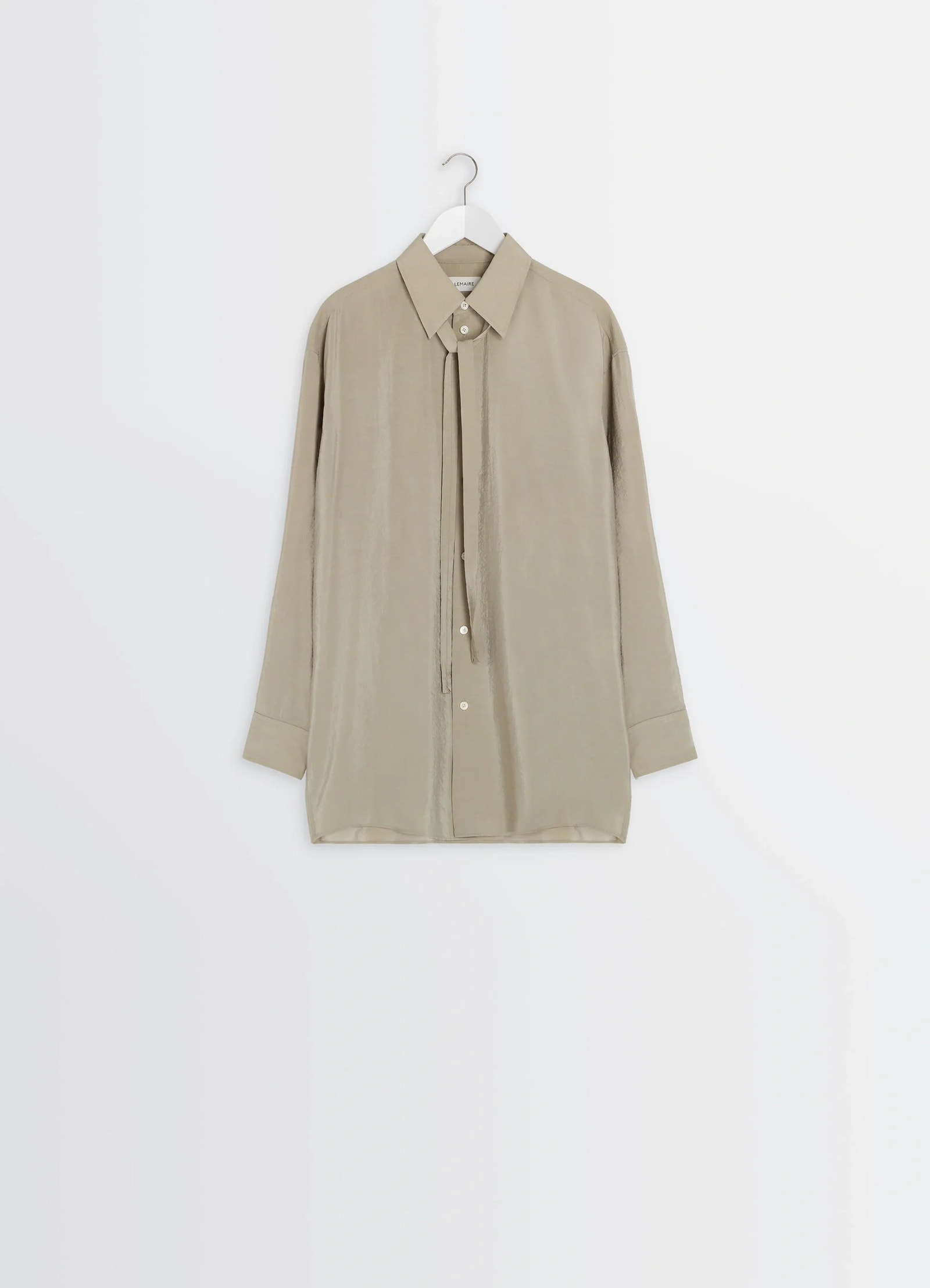 Lemaire long shirt with tie in dry silk blend, product shot, hanging display view straight cut and unbuttoned front