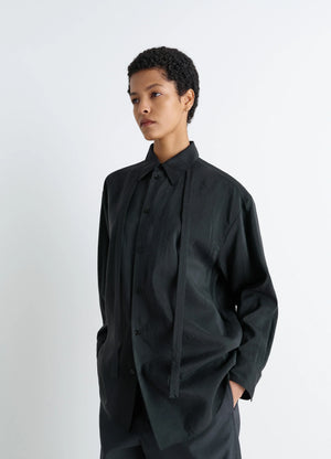 Lemaire Long Shirt with Tie in Black Dry Silk Blend, model shot, Three-quarter front view Oversized, necktie-style