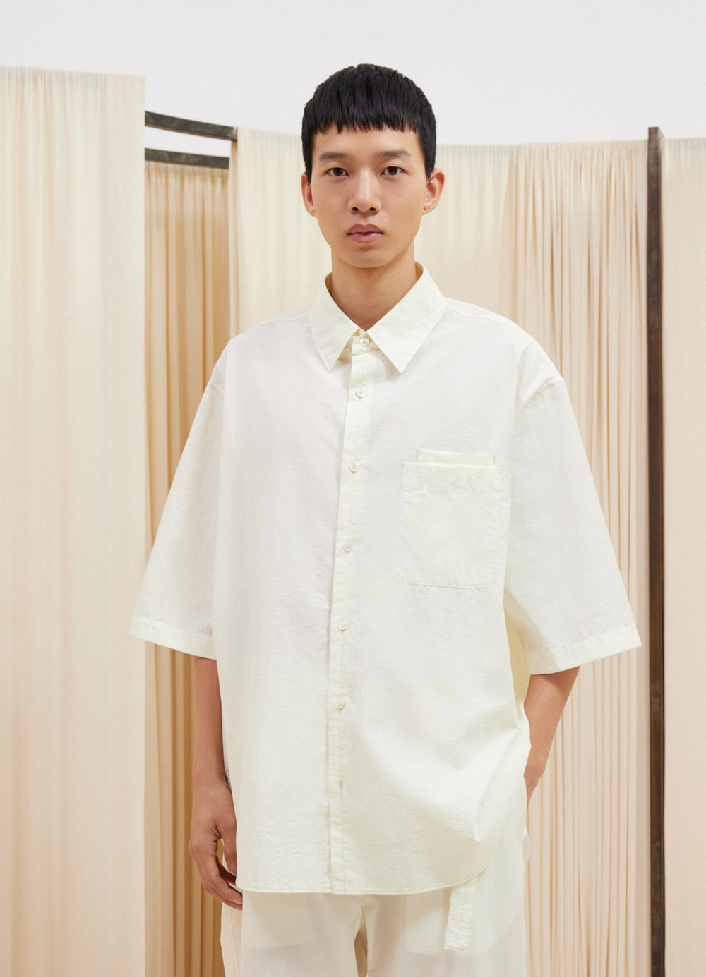Lemaire Double Pocket Short Sleeve  in Natural Cotton Nylon Blend, model shot, Front view Relaxed fit with pockets