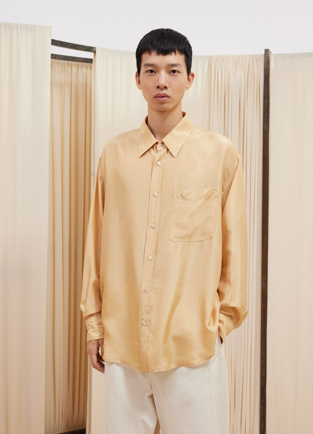 Lemaire Loose Shirt in Light Silk Habotai, model shot, front view classic collar, chest pocket