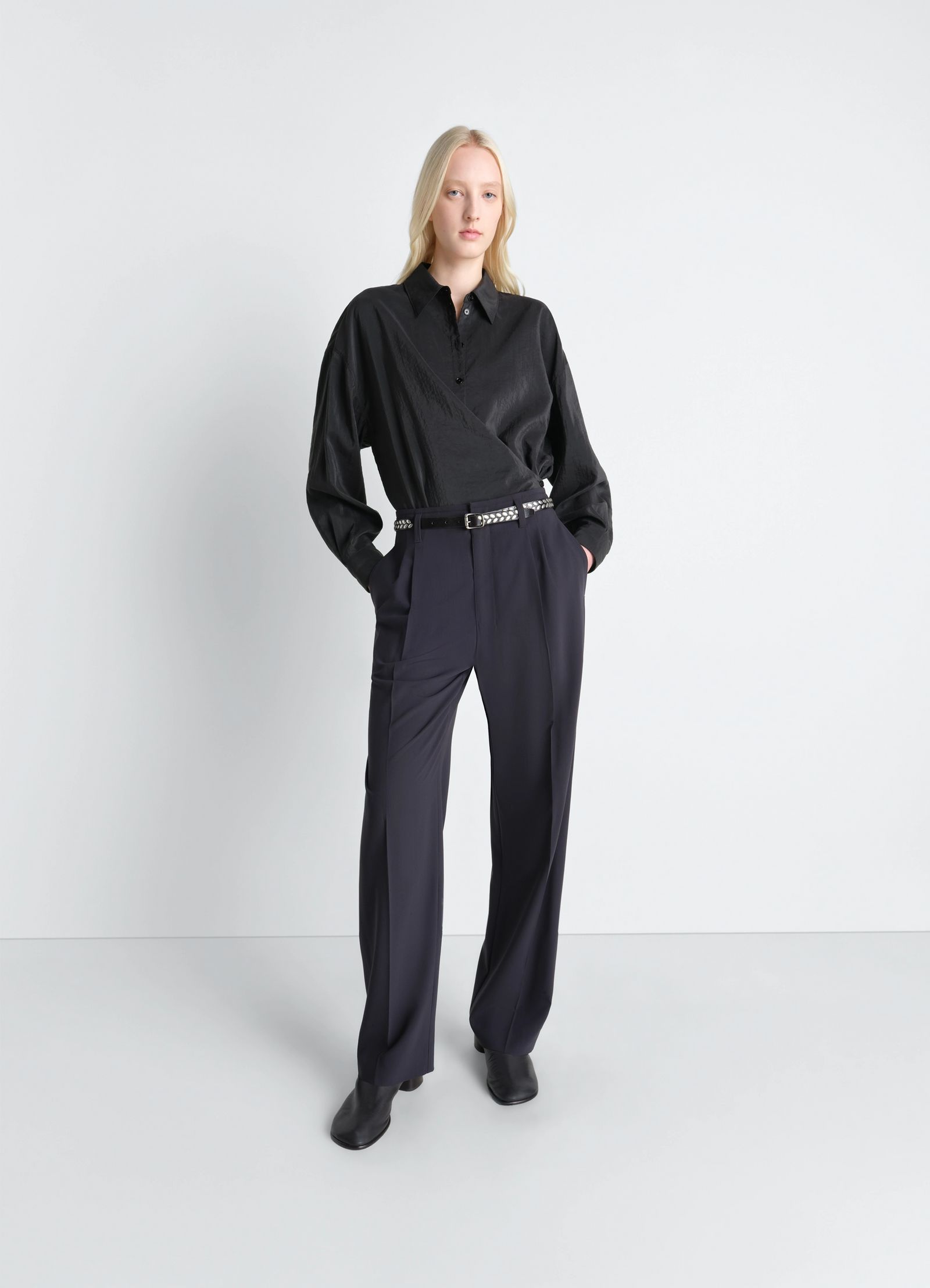 Straight collar twisted shirt in dry silk, model shot, three-quarter view asymmetrical drape