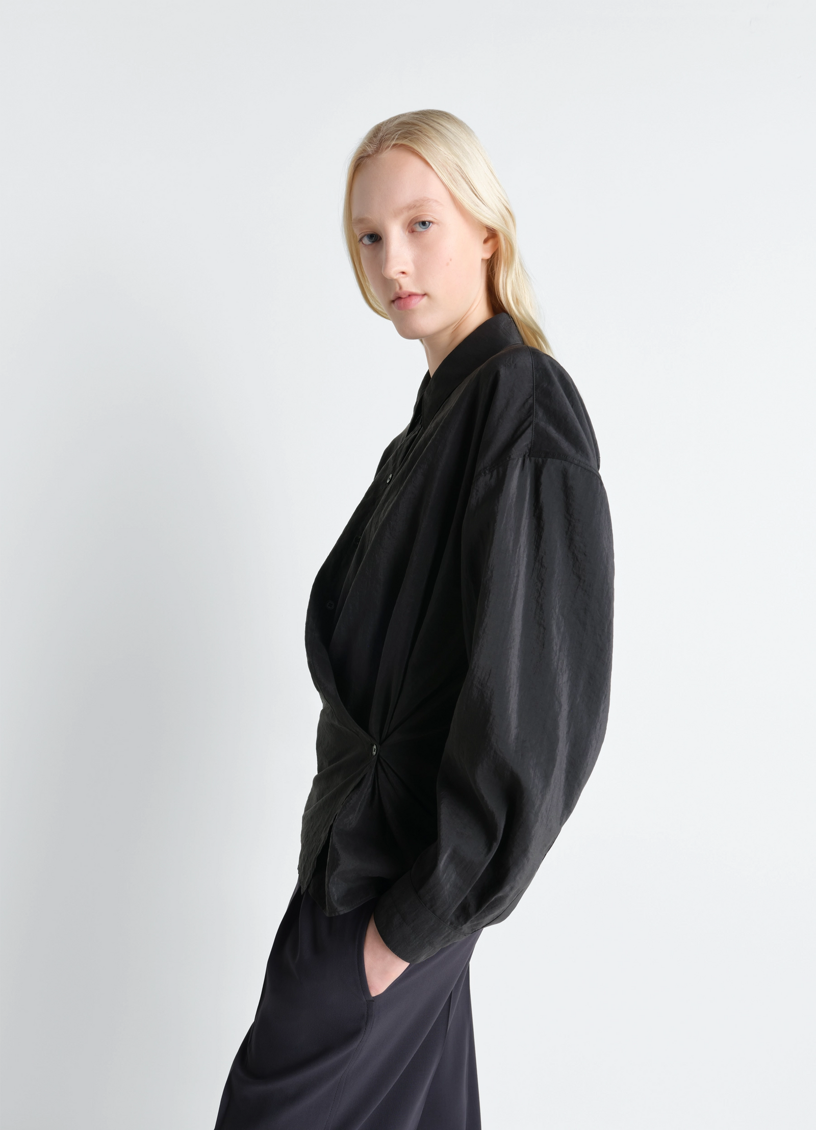 Straight collar twisted shirt in dry silk, model shot, side view gathered back drape