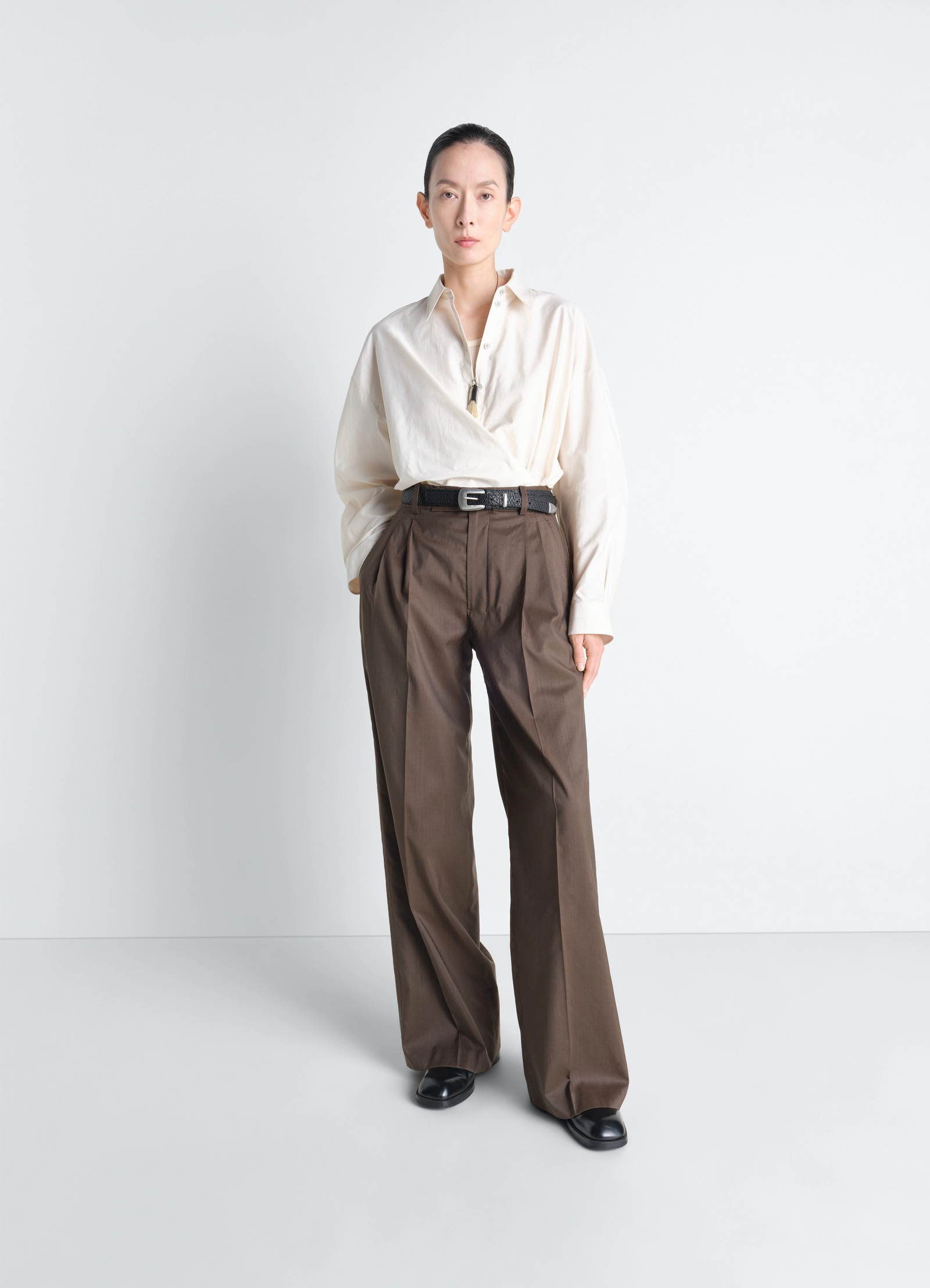 Straight collar twisted shirt in washed cotton silk, model shot, side view style worn by model