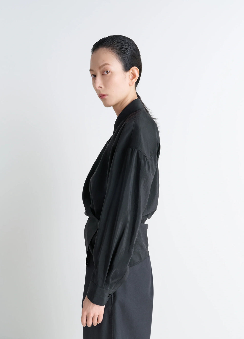 Lemaire Straight Collar Twisted Shi in Black Dry Silk Blend, model shot, back view structured shoulders visible