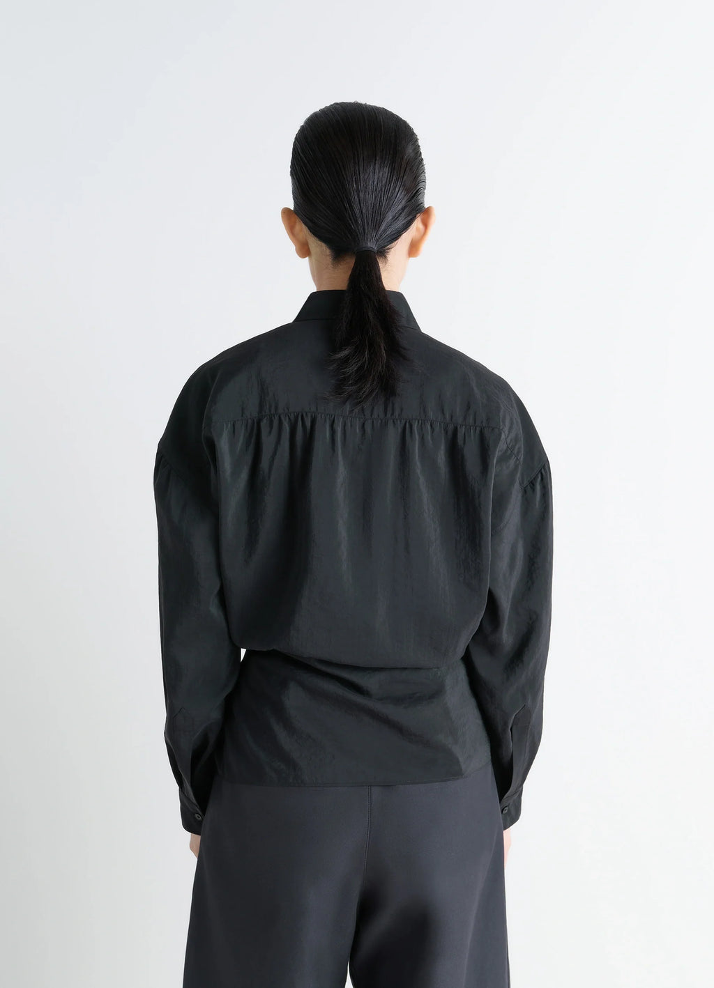 Lemaire Straight Collar Twisted Shi in Black Dry Silk Blend, model shot, overhead back view gathered yoke detail