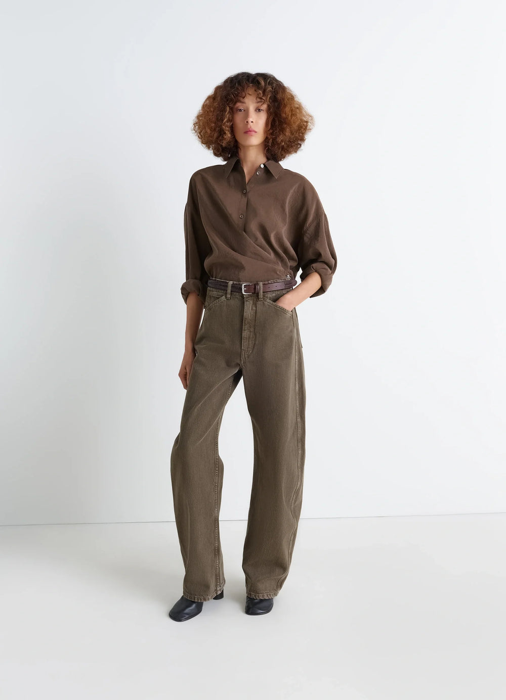 Lemaire Straight Collar Twisted Shi in Dry Silk Blend, model shot, porte side view loose fit rolled sleeves