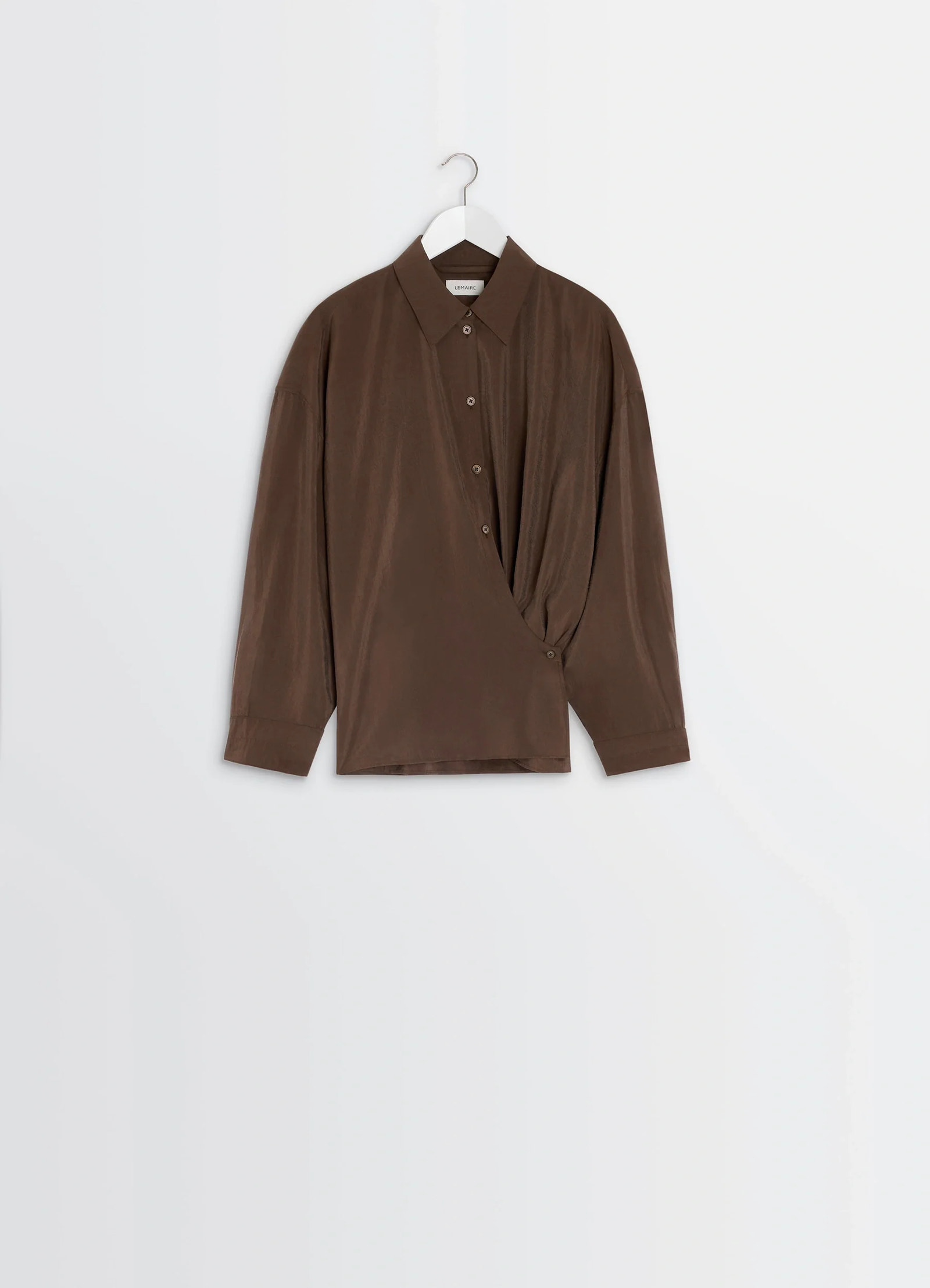 Lemaire straight collar twisted shi in dry silk blend, product shot, hanging view diagonal button closure