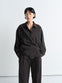 Lemaire Twisted Shirt in Dark Dry Silk, model shot, Front view Asymmetric button placket