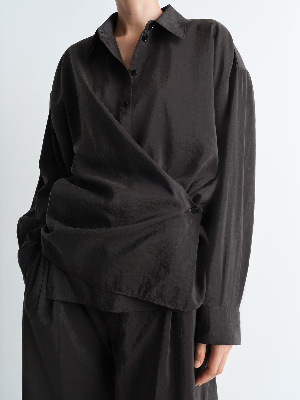 Lemaire Twisted Shirt in Dark Dry Silk, model shot, detail shot overlapping wrap front