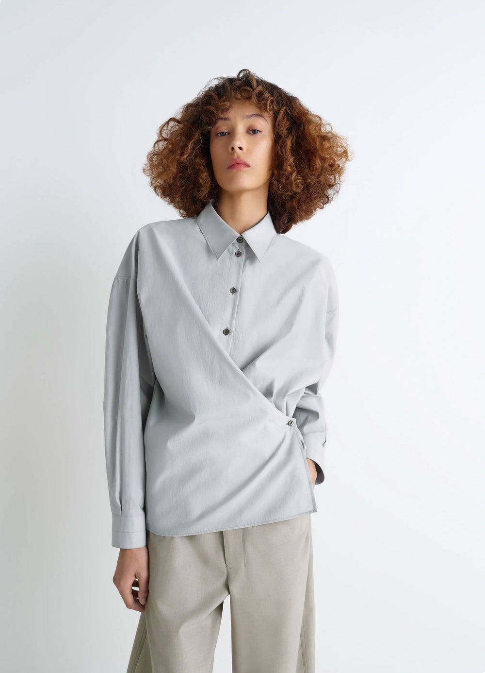 Lemaire Twisted Shirt in Cotton-Silk Light Patina, model shot, front side view straight collar, twisted design