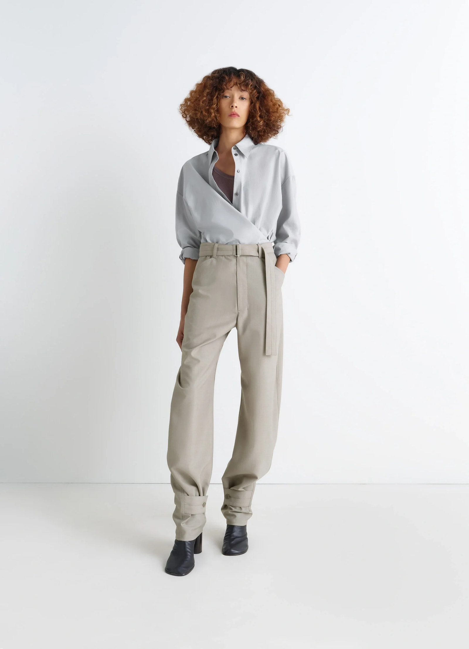 Lemaire twisted shirt in cotton-silk light patina, model shot, full body view cross-button wrap