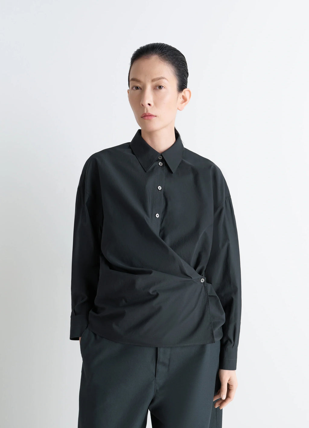 Lemaire Straight Collar Twisted Shi in Black washed cotton-silk blend, model shot, Front view Twisted front detail