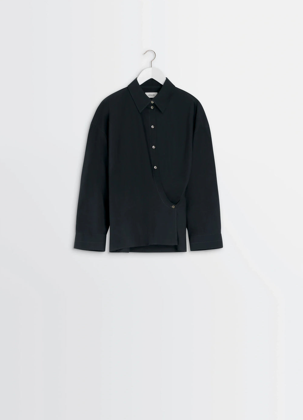 Lemaire Straight Collar Twisted Shi in Black washed cotton-silk blend, product shot, top angleshot in ful asymmetrical hem de