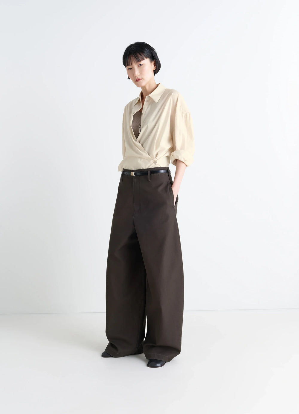 Lemaire Straight Collar Twisted Shi in Cream Washed Cotton-Silk, model shot, three-quarter view crossed front overlap