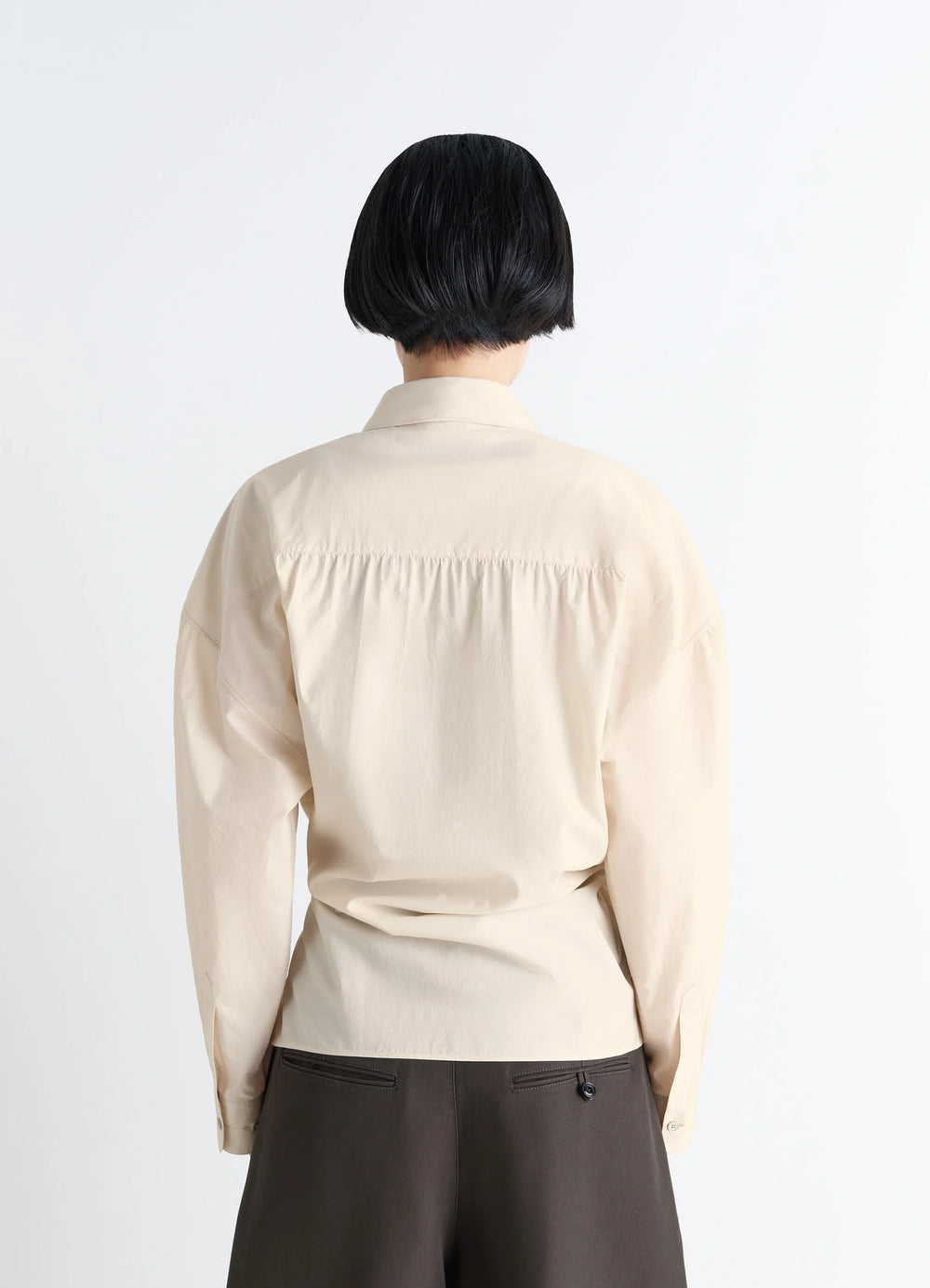 Lemaire Straight Collar Twisted Shi in Cream Washed Cotton-Silk, model shot, back view gathered back yoke