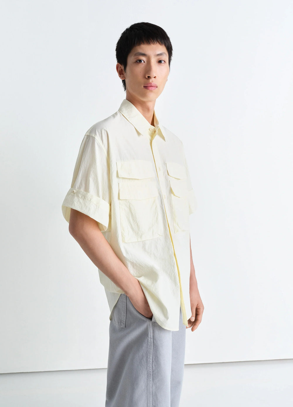 Utility Shirt in Light Cotton Crepe, model shot, three-quarter view short sleeve double pocket