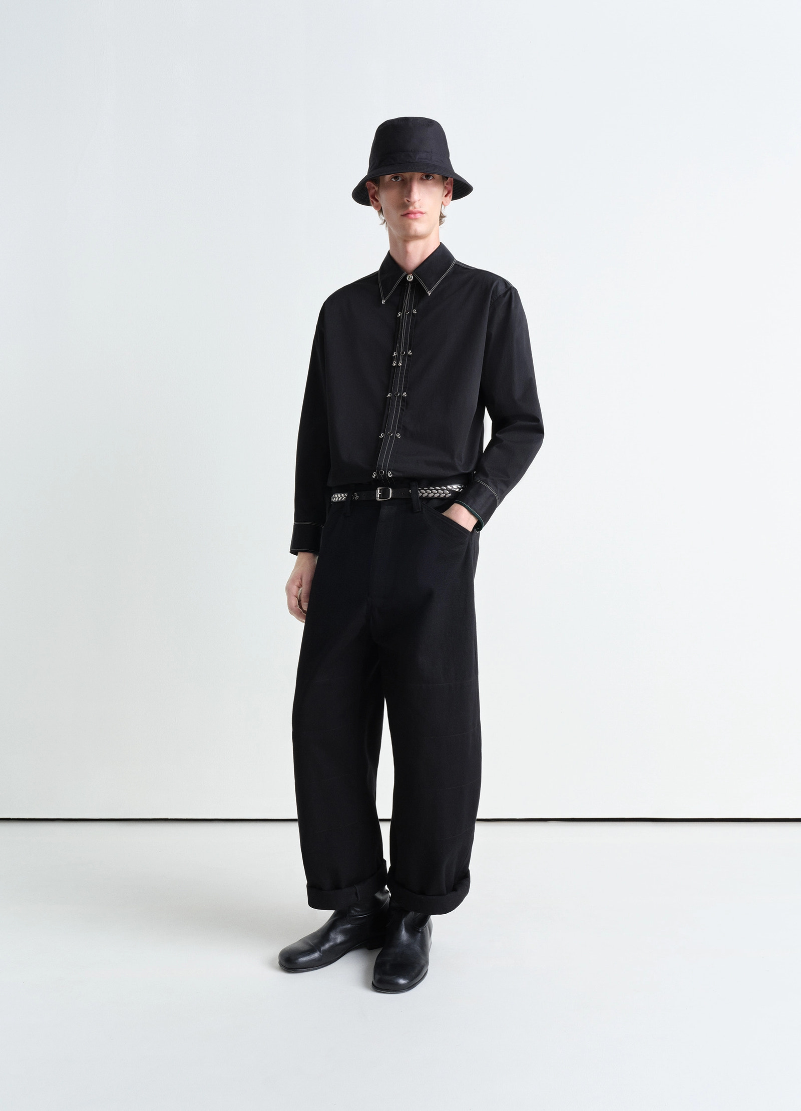Embellished metal shirt in black cotton satin, model shot, side view bucket hat styled