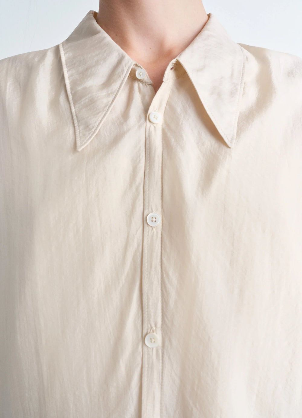 Lemaire Light Pointed Collar Shirt in Airy Light Silk Chiffon, model shot, detail shot pointed collar close-up