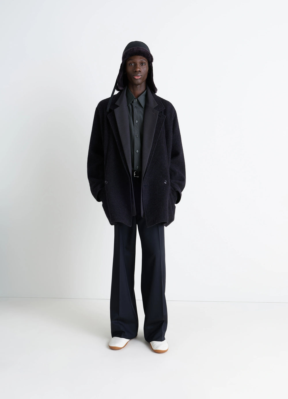 Lemaire Double Pocket Shirt in Cotton Crepe, model shot, full body shot layered with overcoat