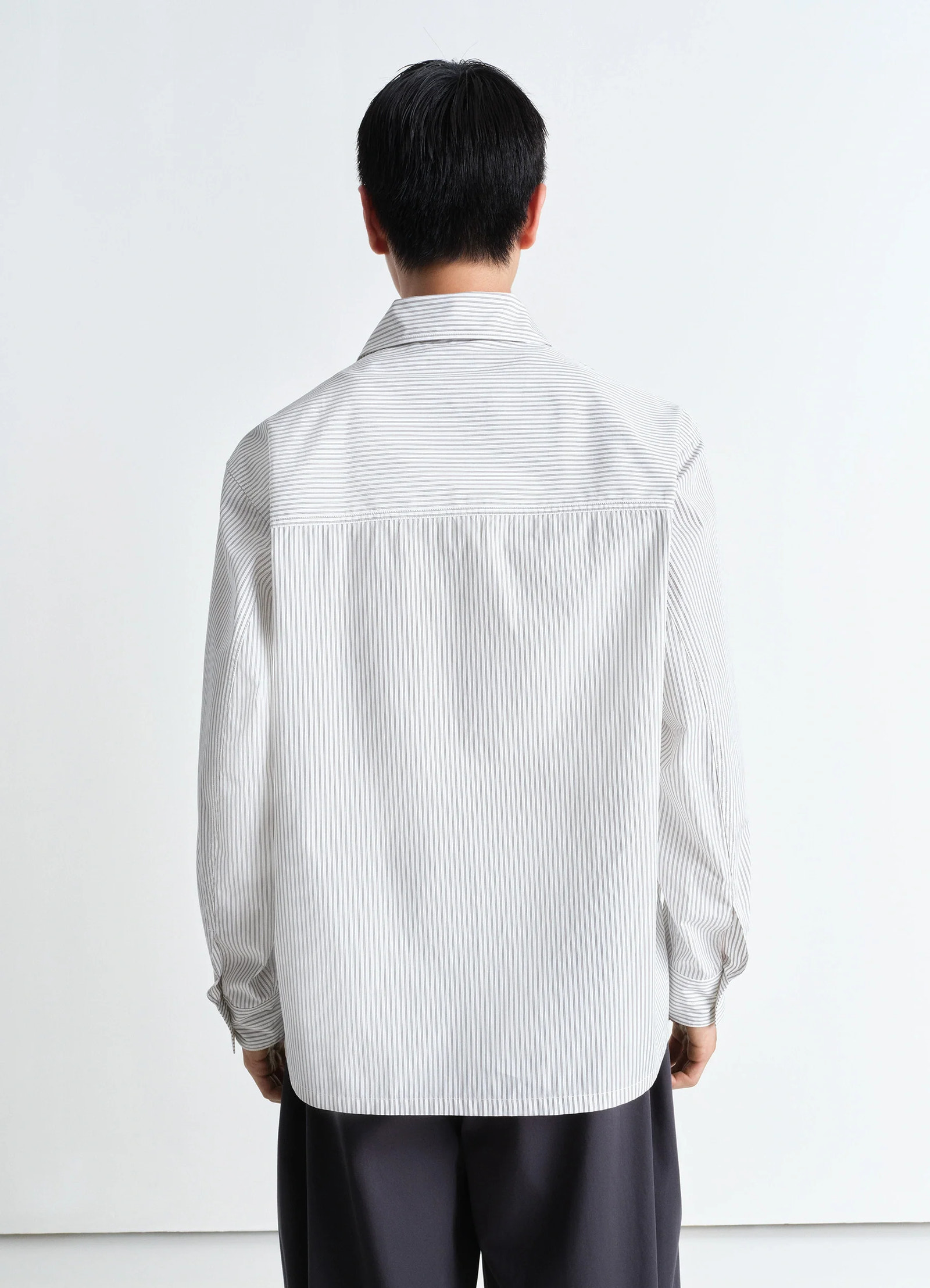 Lemaire pyjama shirt in striped cotton poplin, model shot, full back close-up view dropped shoulder seams