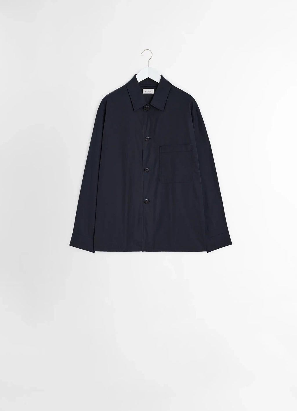 Lemaire Pyjama Shirt in Black Heavy Cotton Washed Poplin, product shot, hanging display view straight hemline visible